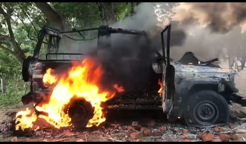 Protesters demanding Sheikh Hasina's return torch an army vehicle in Gopalganj on 10 August, 2024